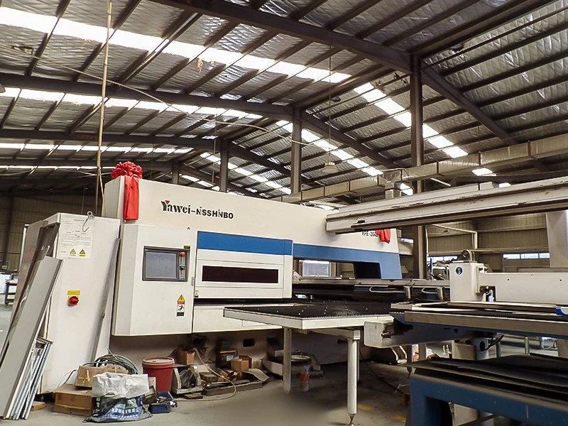 Commercial kitchen equipment factory workshop with production machinery